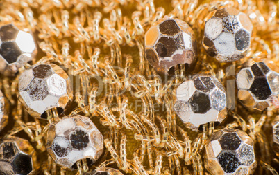 shiny ornaments on handbag