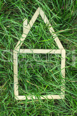 model house made on green grass