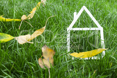 model house made on green grass