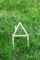 model house made on green grass