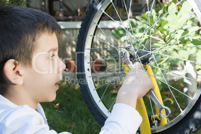 kid who fix bikes