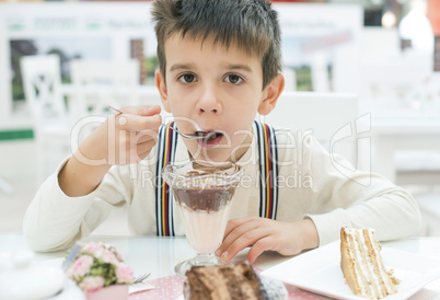 child eat milk choco shake