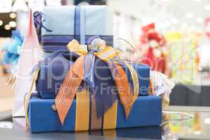 blue gift boxes in shopping center