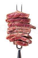 Steakscheiben auf einer Fleischgabel