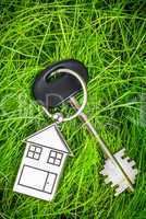 house key and green grass