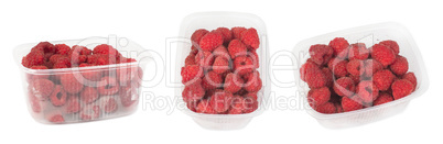 packed raspberries white isolated