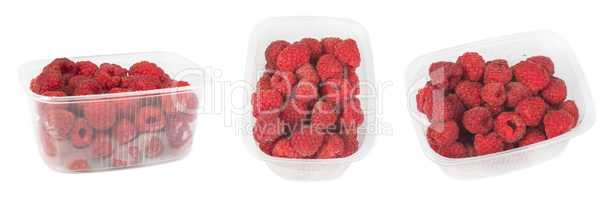 packed raspberries white isolated