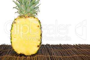 sliced pineapple on wooden table