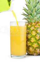 pineapple and glass of juice