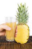 pineapple and glass of juice