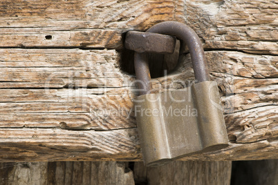 old rotten board with padlock
