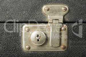 lock of an old travel suitcase