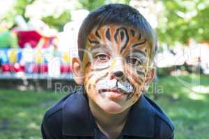 child with painted face