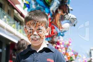 child with painted face