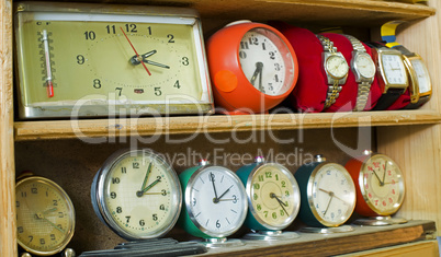 old clocks on a shelf