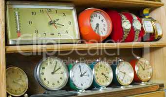 old clocks on a shelf