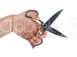 hand and metal scissors