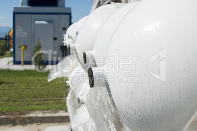 white industrial butan bottles