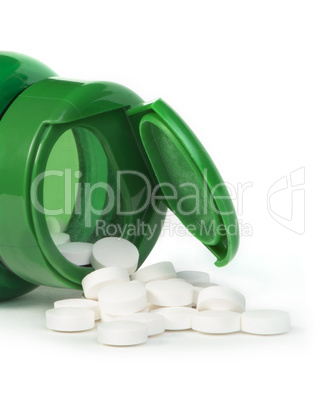 white pills and a container