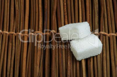 sugar lumps on wooden base