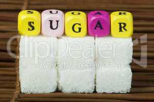 sugar lumps and text
