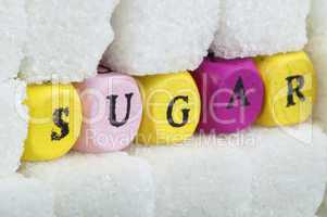 sugar lumps and text