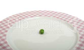 plate with peas white isolated