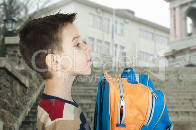 boy with schoolbag