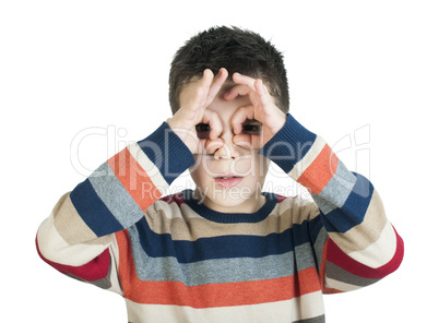 child looking through his ??hands