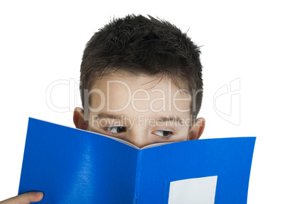 child with notebook in front of the face