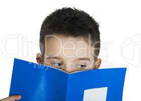 child with notebook in front of the face