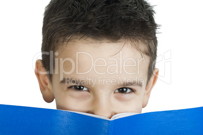 child with notebook in front of the face