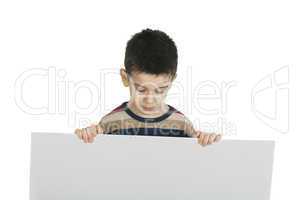 little boy holding a whiteboard
