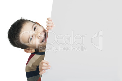 little boy holding a whiteboard little boy holding a whiteboard