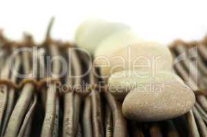 stacked stones on wooden base