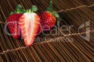 strawberries on wooden base