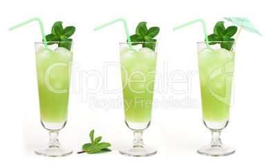 green cocktail with cubes ice