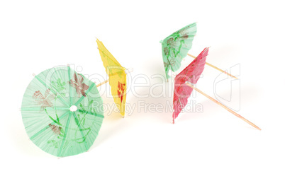 colorful cocktail umbrellas white isolated