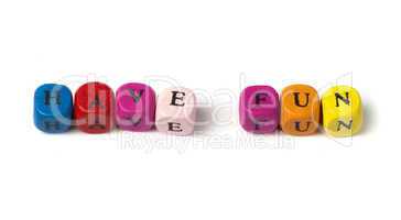 words have fun on multicolored wooden cubes