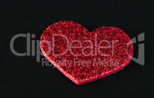 red shiny hearts on black background