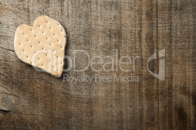 heart shape cookie on wooden background