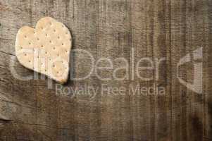 heart shape cookie on wooden background