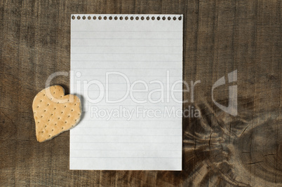 heart shape cookie on wooden background