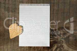 heart shape cookie on wooden background