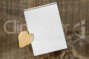 heart shape cookie on wooden background