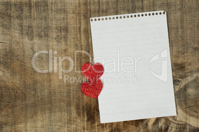 red hearts and white paper sheet