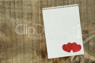 red hearts and white paper sheet