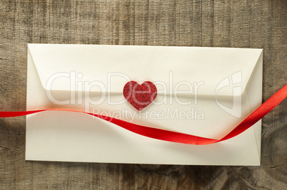 red hearts and white envelope