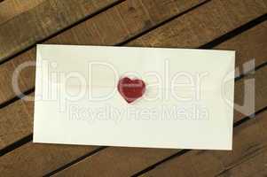 red hearts and white envelope