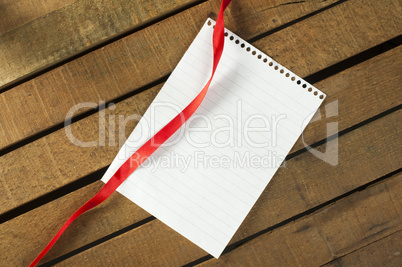 ribbon and white paper sheet